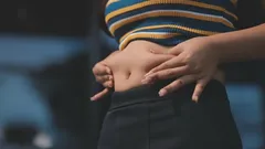 Hur du döljer magen med kläder: Stilsäkra knep för kurviga figurer